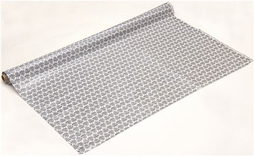 white Riley Blake laminate fabric with black ornaments 3