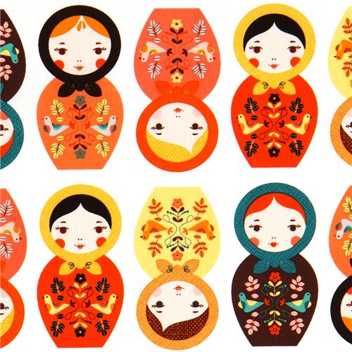 white Robert Kaufman fabric with matryoshkas orange yellow 1
