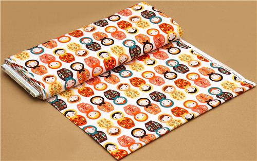 white Robert Kaufman fabric with matryoshkas orange yellow 3