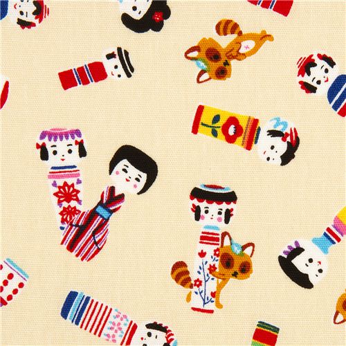 yellow Japanese fabric kokeshi dolls from Cosmo Fabric