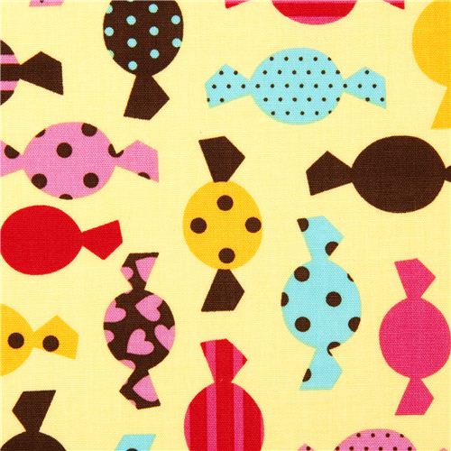 yellow fabric with candy by Robert Kaufman 1