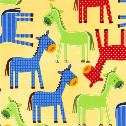 yellow fabric with dotted horses par Robert Kaufman USA 1